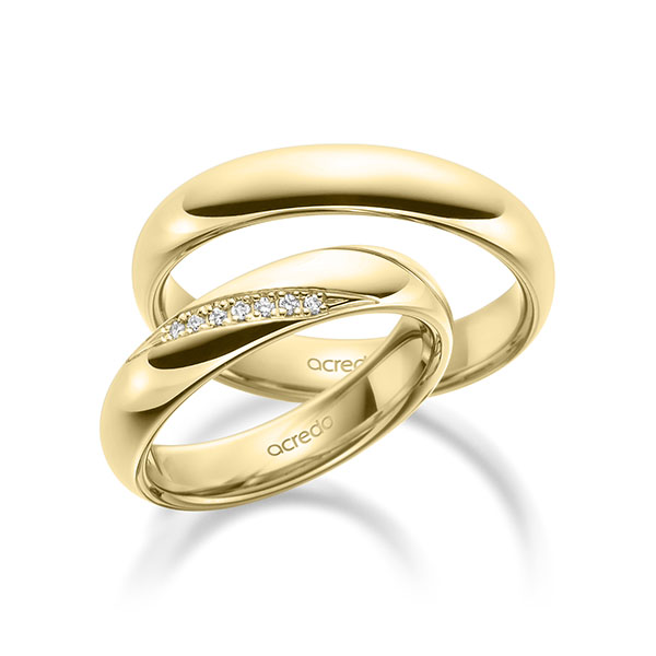 Set klassieke trouwringen in buiten geelgoud 14 kt. , binnen geelgoud 14 kt. met in totaal 0,056 ct. Briljant tw/si van acredo