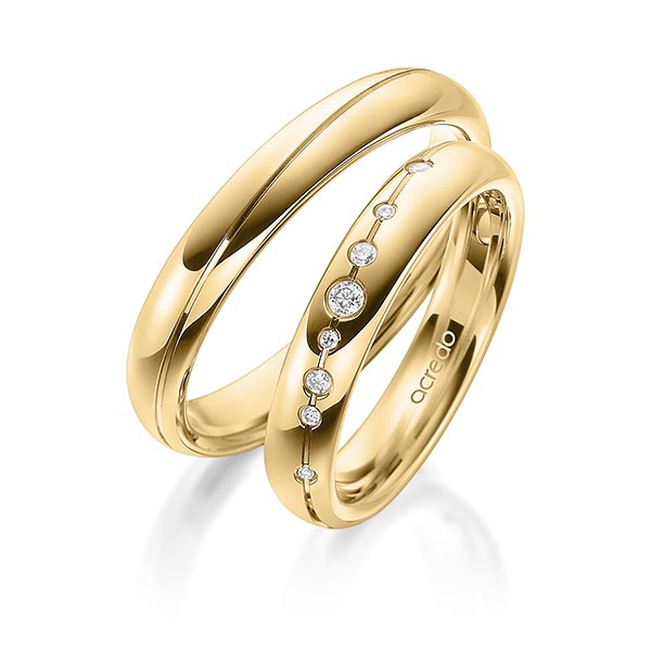 Set Klassieke trouwringen in buiten geelgoud 14 kt. , binnen geelgoud 14 kt. met in totaal 0,08 ct. Briljant tw/si van acredo