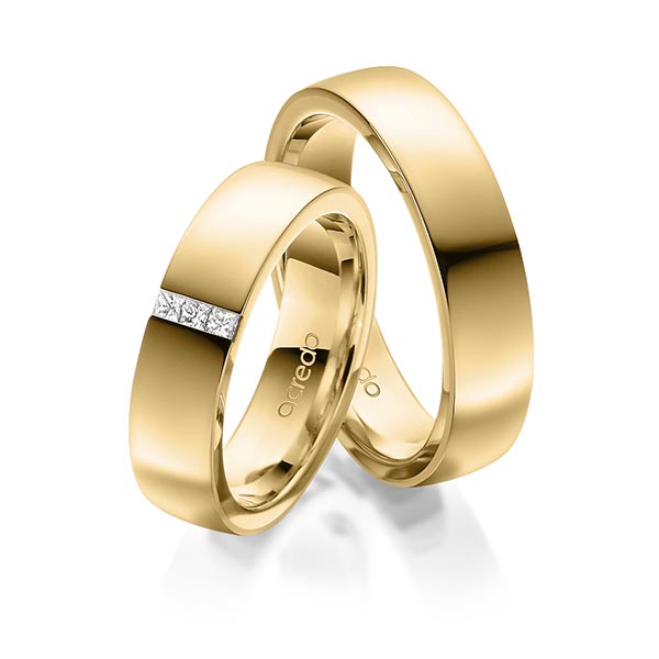 Set klassieke trouwringen in buiten geelgoud 14 kt. , binnen geelgoud 14 kt. met in totaal 0,09 ct. Princess-Diamant tw/si van acredo - A-1673-6