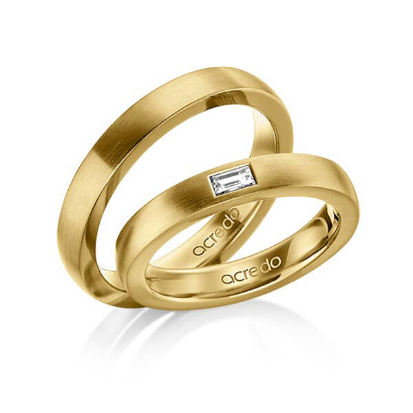 Set klassieke trouwringen in buiten geelgoud 14 kt. , binnen geelgoud 14 kt. met in totaal 0,15 ct. Baguette-Diamant tw,vs van acredo
