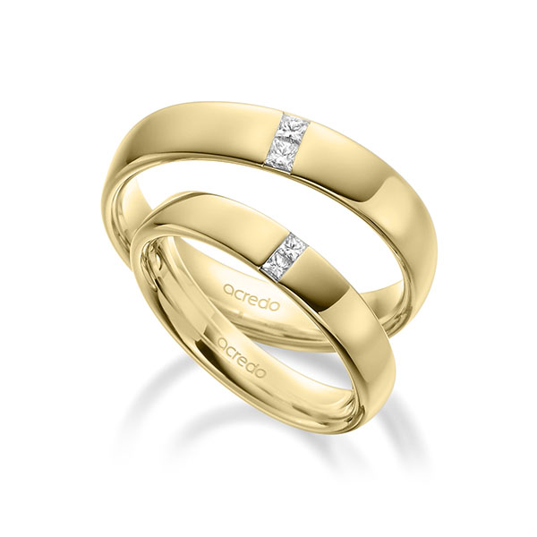 Set klassieke trouwringen in buiten geelgoud 14 kt. , binnen geelgoud 14 kt. met in totaal 0,18 ct. Princess-Diamant tw/si van acredo