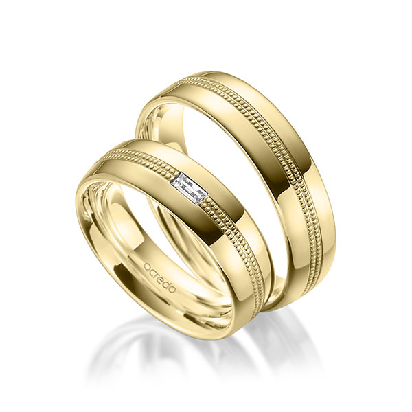 Set Klassieke trouwringen in buiten geelgoud 14 kt. , binnen geelgoud 14 kt. met in totaal 0,1 ct. Baguette-Diamant tw,vs van acredo