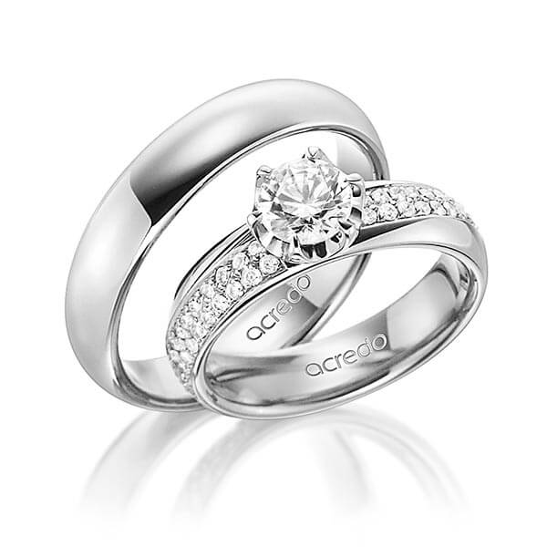 Set klassieke trouwringen in buiten grijsgoud 14 kt. , binnen grijsgoud 14 kt. met 0,7 ct. + in totaal 0,672 ct. Briljant & Briljanten tw/si tw,vs van acredo