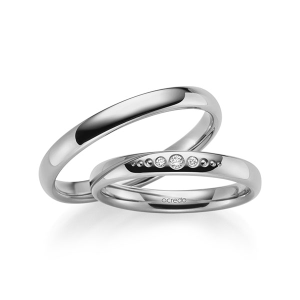 Set klassieke trouwringen in buiten grijsgoud 14 kt. , binnen grijsgoud 14 kt. met in totaal 0,036 ct. Briljant tw/si van acredo