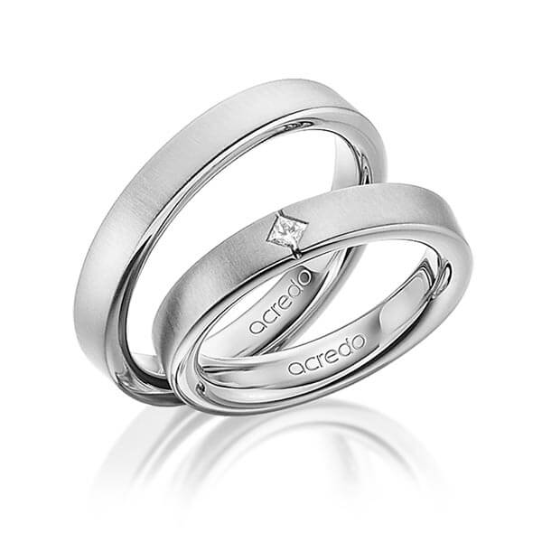 Set klassieke trouwringen in buiten grijsgoud 14 kt. , binnen grijsgoud 14 kt. met in totaal 0,05 ct. Princess-Diamant tw/si van acredo