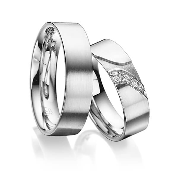 Set klassieke trouwringen in buiten grijsgoud 14 kt. , binnen grijsgoud 14 kt. met in totaal 0,075 ct. Briljant tw/si van acredo - A-3021-7 Set klassieke trouwringen in buiten grijsgoud 14 kt. , binnen grijsgoud 14 kt. met in totaal 0,075 ct. Briljant tw/si van acredo - A-3021-7