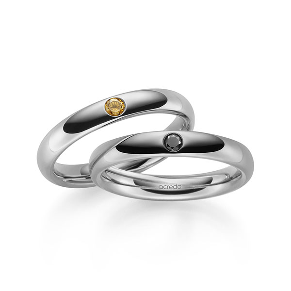 Set klassieke trouwringen in buiten grijsgoud 14 kt. , binnen grijsgoud 14 kt. met in totaal 0,12 ct. Briljant Zwart Cognac van acredo