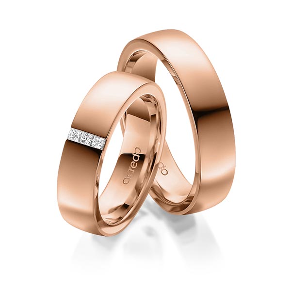 Set klassieke trouwringen in buiten roodgoud 14 kt. , binnen roodgoud 14 kt. met in totaal 0,09 ct. Princess-Diamant tw/si van acredo