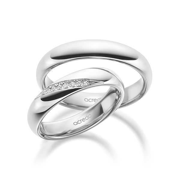 Set klassieke trouwringen in buiten witgoud 14 kt. , binnen witgoud 14 kt. met in totaal 0,056 ct. Briljant tw/si van acredo