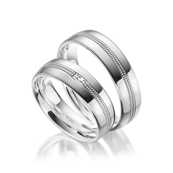 Set Klassieke trouwringen in buiten witgoud 14 kt. , binnen witgoud 14 kt. met in totaal 0,1 ct. Baguette-Diamant tw,vs van acredo