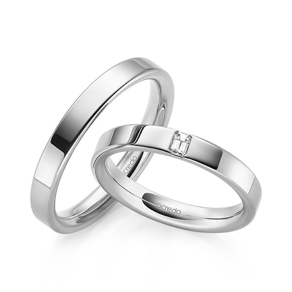 Set klassieke trouwringen in buiten witgoud 14 kt. , binnen witgoud 14 kt. met in totaal 0,1 ct. tw,vs van acredo
