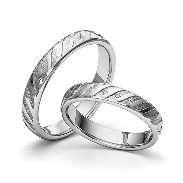 Set klassieke trouwringen in edelstaal Laser Structuur met in totaal 0,015 ct. Briljant tw/si van Eternal Touch