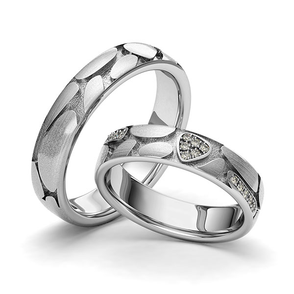 Set klassieke trouwringen in edelstaal Laser Structuur met in totaal 0,07 ct. Briljant tw/si van Eternal Touch