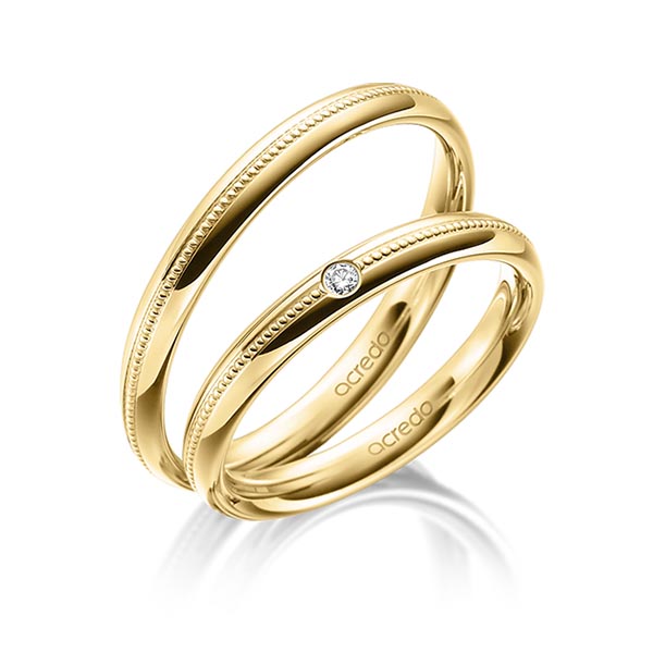 Set Klassieke trouwringen in geelgoud 14 kt. met in totaal 0,03 ct. Briljant tw/si van acredo