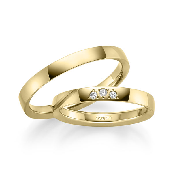 Set klassieke trouwringen in geelgoud 14 kt. met in totaal 0,045 ct. Briljant tw/si van acredo