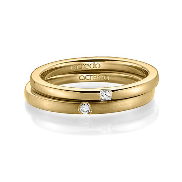 Set klassieke trouwringen in geelgoud 14 kt. met in totaal 0,055 ct. Princess-Diamant & Briljant tw/si van acredo