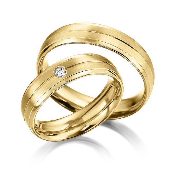 Set Klassieke trouwringen in geelgoud 14 kt. met in totaal 0,05 ct. Briljant tw/si van acredo