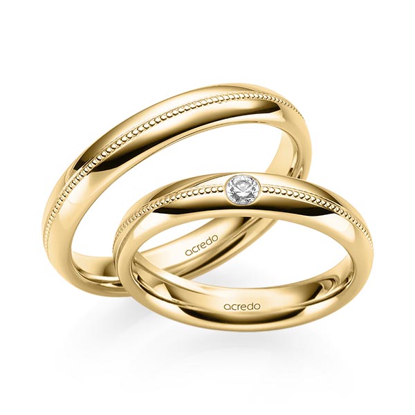 Set Klassieke trouwringen in geelgoud 14 kt. met in totaal 0,06 ct. Briljant tw/si van acredo