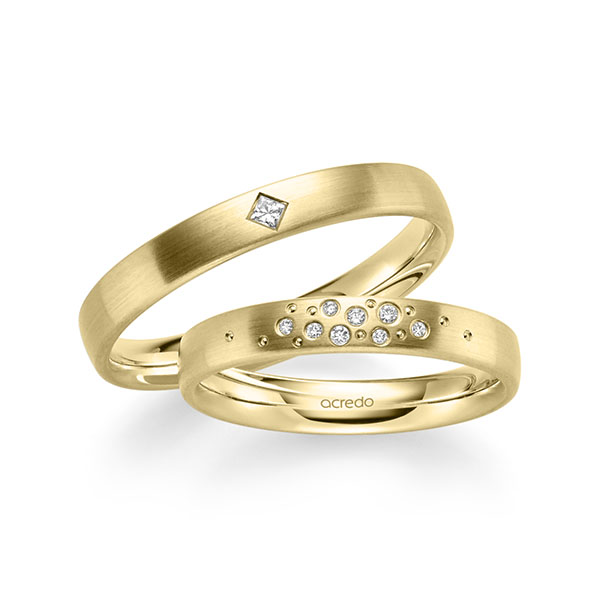 Set klassieke trouwringen in geelgoud 14 kt. met in totaal 0,081 ct. Briljant & Princess-Diamant tw/si van acredo