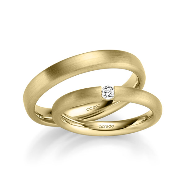 Set klassieke trouwringen in geelgoud 14 kt. met in totaal 0,08 ct. Briljant tw/si van acredo