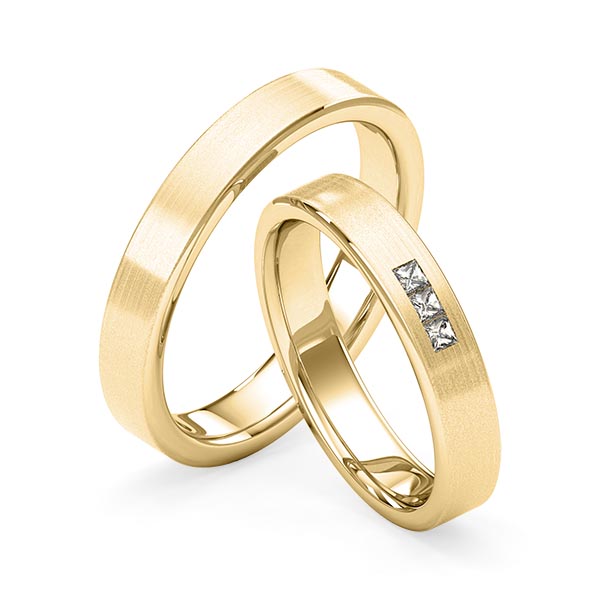 Set klassieke trouwringen in geelgoud 14 kt. met in totaal 0,09 ct. Princess-Diamant tw,vs van Merii