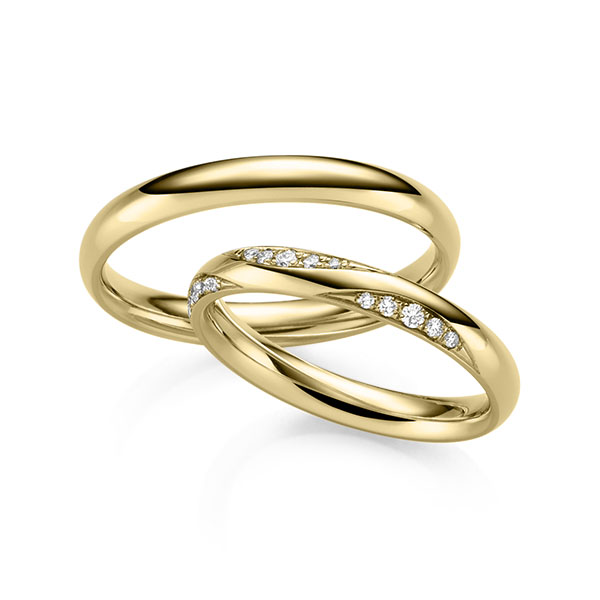 Set klassieke trouwringen in geelgoud 14 kt. met in totaal 0,135 ct. Briljant tw/si van Eternal Touch