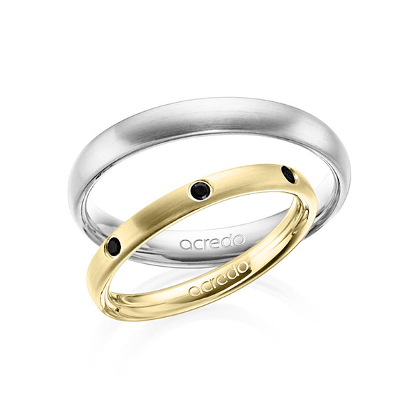 Set klassieke trouwringen in geelgoud 14 kt. met in totaal 0,14 ct. Briljant Zwart van acredo