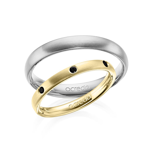 Set klassieke trouwringen in geelgoud 14 kt. met in totaal 0,14 ct. Briljant Zwart van acredo