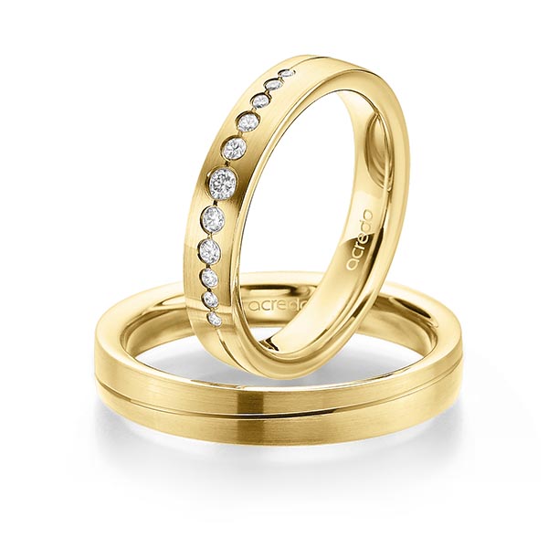 Set Klassieke trouwringen in geelgoud 14 kt. met in totaal 0,156 ct. Briljant tw/si van acredo