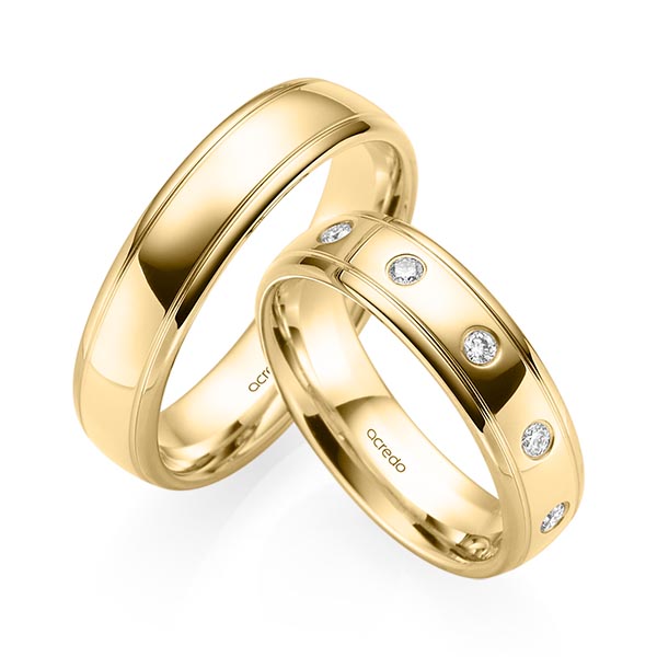 Set Klassieke trouwringen in geelgoud 14 kt. met in totaal 0,15 ct. Briljant tw/si van acredo