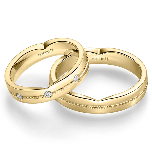 Set Klassieke trouwringen in geelgoud 14 kt. met in totaal 0,24 ct. Briljant tw/si van acredo