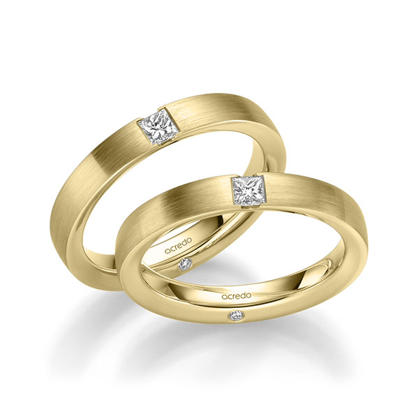 Set klassieke trouwringen in geelgoud 14 kt. met in totaal 0,44 ct. Princess-Diamant & Briljant tw/si van acredo
