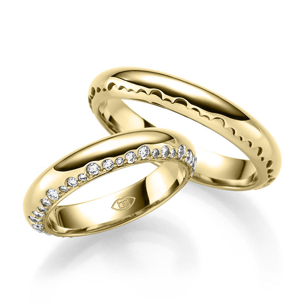 Set Klassieke trouwringen in geelgoud 14 kt. met in totaal 0,6 ct. Briljant tw/si 