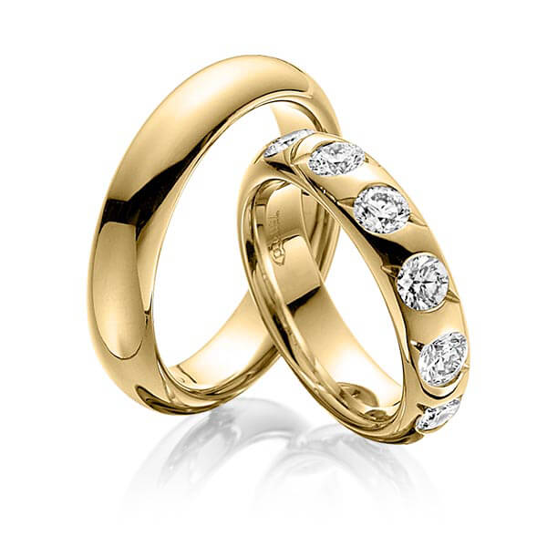 Set klassieke trouwringen in geelgoud 14 kt. met in totaal 1,32 ct. Briljant tw/si van Eternal Touch