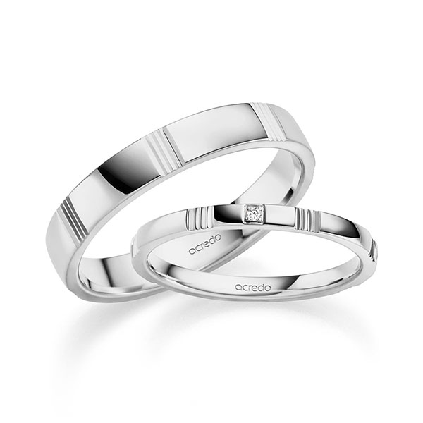 Set Klassieke trouwringen in grijsgoud 14 kt. met in totaal 0,008 ct. Briljant tw,vs van acredo