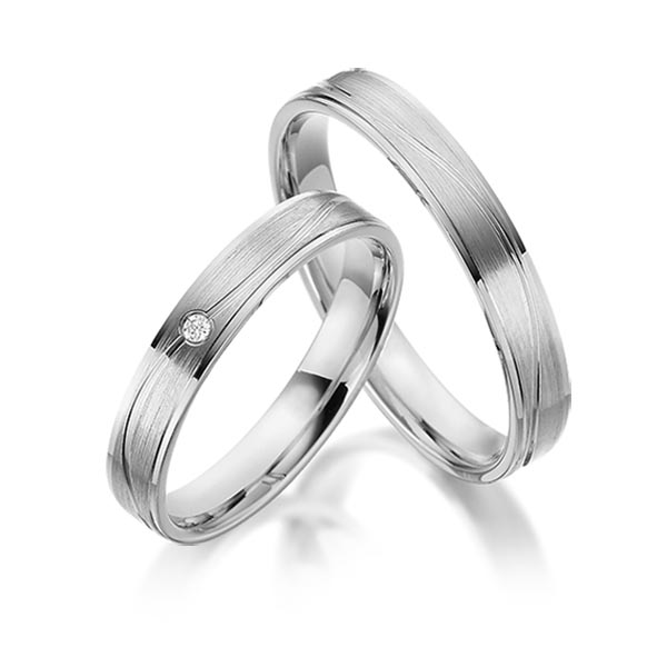 Set Klassieke trouwringen in grijsgoud 14 kt. met in totaal 0,015 ct. Briljant tw/si van acredo