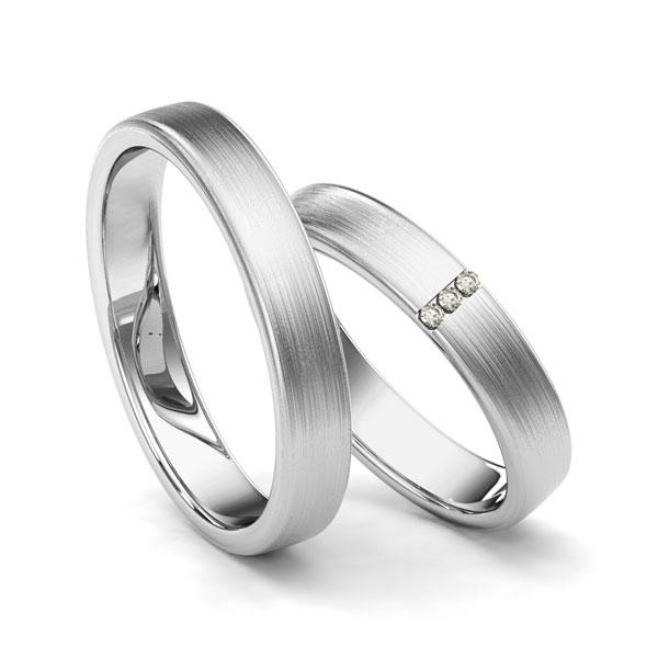 Set klassieke trouwringen in grijsgoud 14 kt. met in totaal 0,024 ct. Briljant tw/si van Merii
