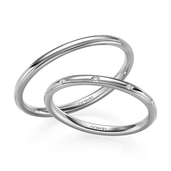 Set Klassieke trouwringen in grijsgoud 14 kt. met in totaal 0,025 ct. Briljant tw/si van acredo