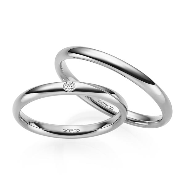 Set klassieke trouwringen in grijsgoud 14 kt. met in totaal 0,02 ct. Briljant tw/si van acredo