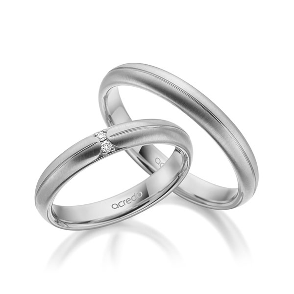 Set Klassieke trouwringen in grijsgoud 14 kt. met in totaal 0,03 ct. Briljant tw/si van acredo