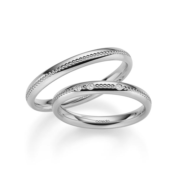 Set Klassieke trouwringen in grijsgoud 14 kt. met in totaal 0,03 ct. Briljant tw/si van acredo