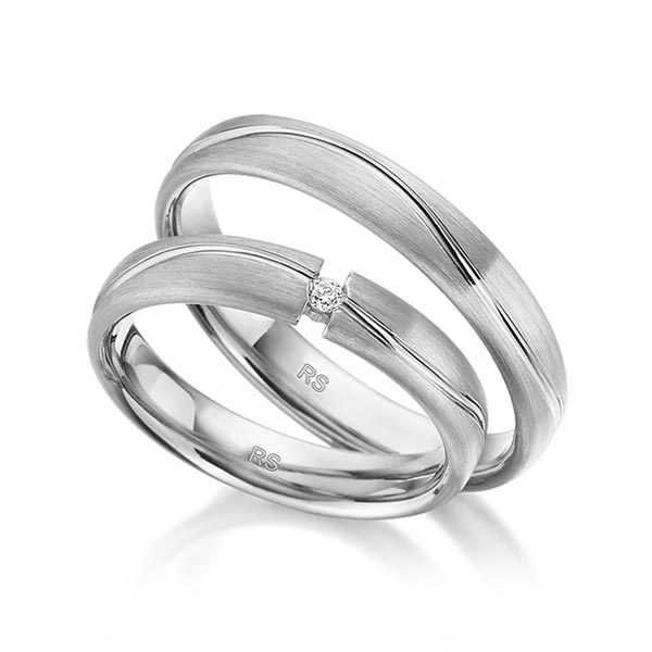 Set Klassieke trouwringen in grijsgoud 14 kt. met in totaal 0,03 ct. Briljant tw/si van acredo