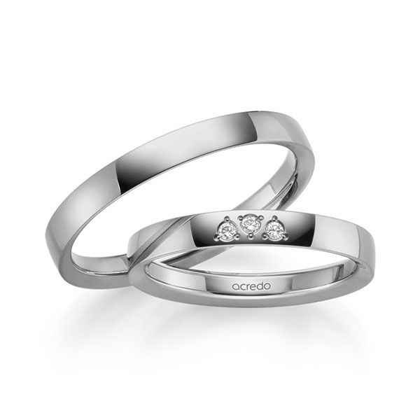 Set klassieke trouwringen in grijsgoud 14 kt. met in totaal 0,045 ct. Briljant tw/si van acredo