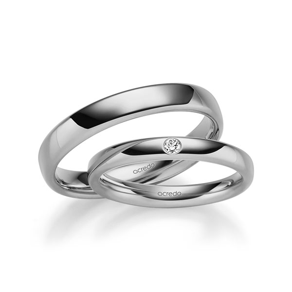Set klassieke trouwringen in grijsgoud 14 kt. met in totaal 0,04 ct. Briljant tw/si van acredo