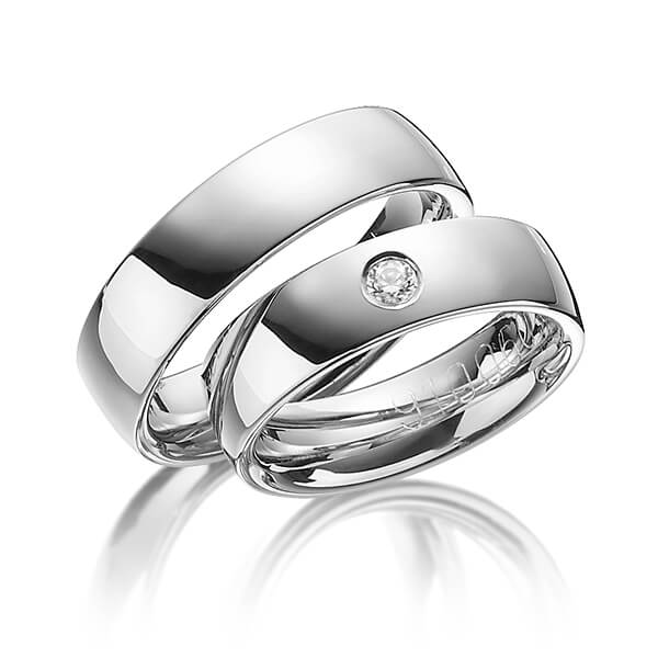 Set klassieke trouwringen in grijsgoud 14 kt. met in totaal 0,04 ct. Briljant tw/si van Merii