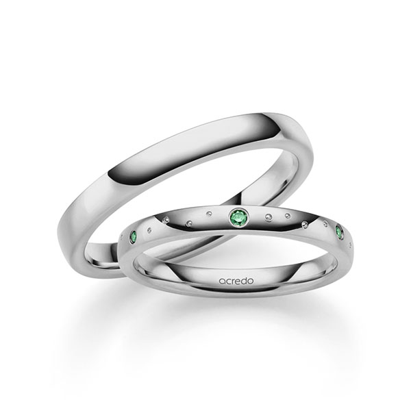 Set klassieke trouwringen in grijsgoud 14 kt. met in totaal 0,056 ct. Briljant van acredo