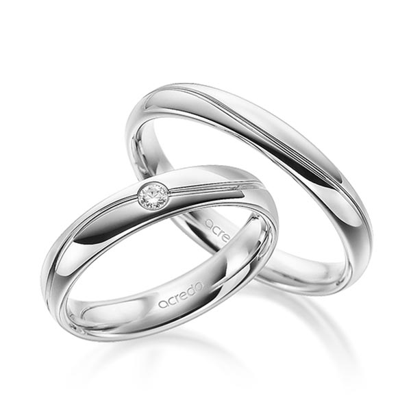 Set Klassieke trouwringen in grijsgoud 14 kt. met in totaal 0,05 ct. Briljant tw/si van acredo