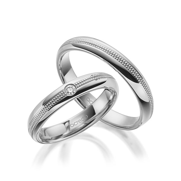 Set Klassieke trouwringen in grijsgoud 14 kt. met in totaal 0,05 ct. Briljant tw/si van acredo