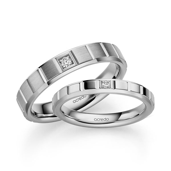Set Klassieke trouwringen in grijsgoud 14 kt. met in totaal 0,05 ct. Briljant tw/si van acredo