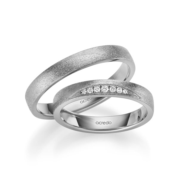Set Klassieke trouwringen in grijsgoud 14 kt. met in totaal 0,061 ct. Briljant tw/si van acredo